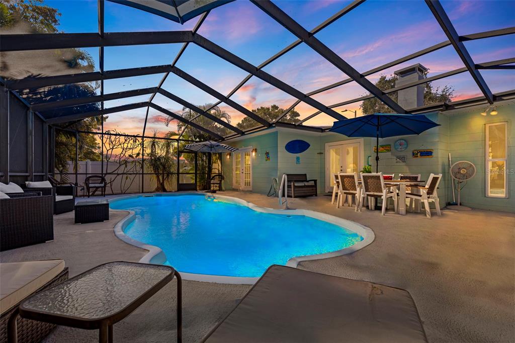 4781 97th Way North St. Petersburg, FL 33708 - Photo 2 of 47 a view of patio with table and chairs