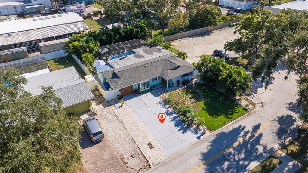4781 97th Way North St. Petersburg, FL 33708 - Photo 39 of 47 an aerial view of a house with a yard