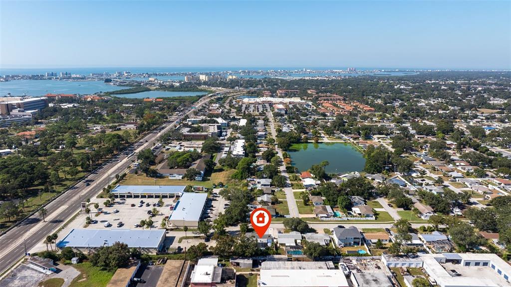 4781 97th Way North St. Petersburg, FL 33708 - Photo 42 of 47 an aerial view of city and lake