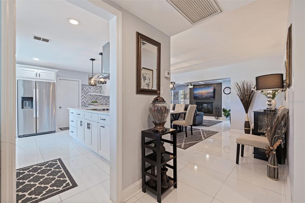 4781 97th Way North St. Petersburg, FL 33708 - Photo 6 of 47 a view of a livingroom with furniture and a flat screen tv