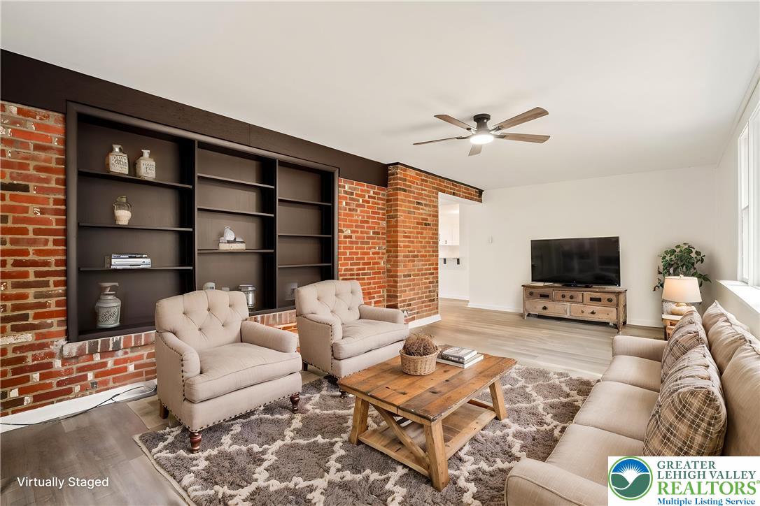 767 East Rock Road Allentown, PA 18103 - Photo 7 of 22 a living room with furniture and a flat screen tv