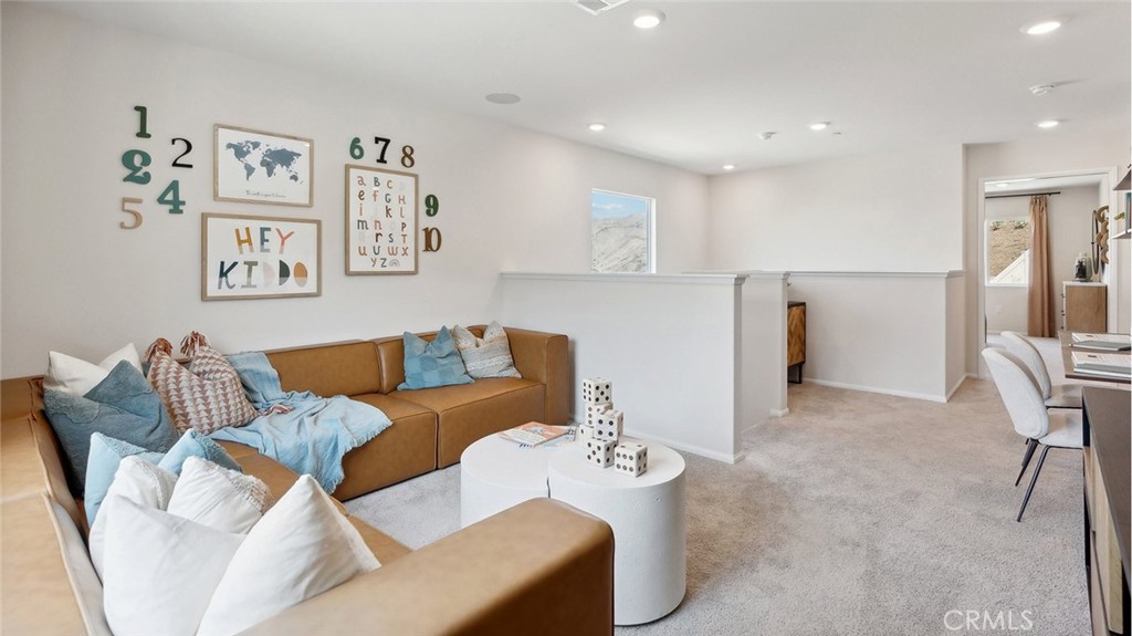 11392 Forge Road Corona, CA 92883 - Photo 14 of 24 a living room with furniture and a wooden floor