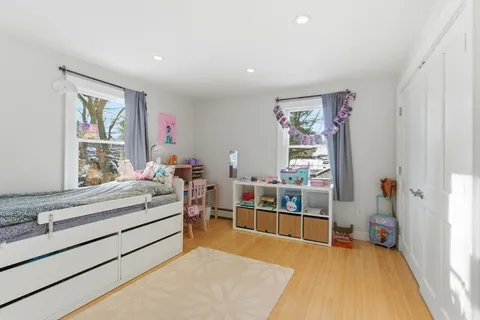 a view of living room with furniture and window