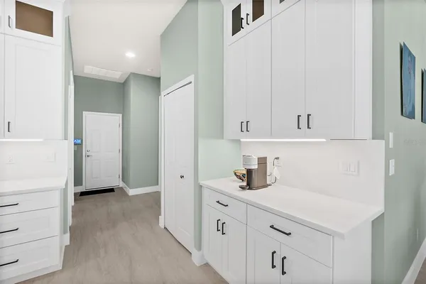 a bedroom with a bed and a ceiling fan