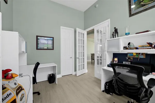 a kitchen with stainless steel appliances white cabinets and a stove