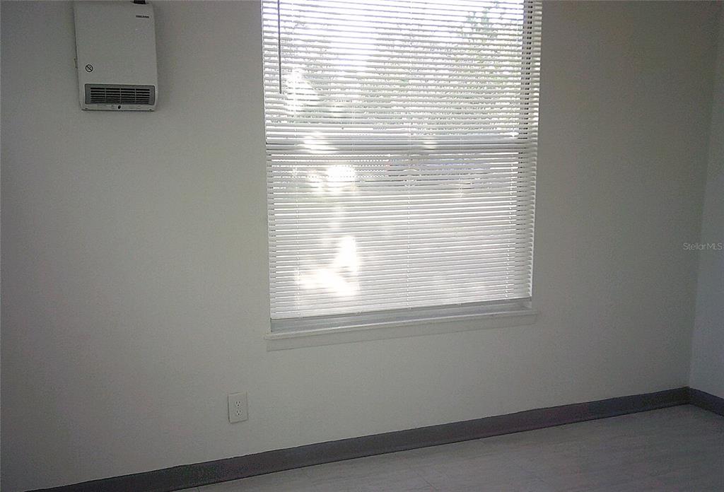 1060 65th Street South St. Petersburg, FL 33707 - Photo 11 of 20 a view of a window in an empty room