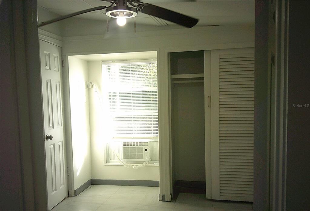 1060 65th Street South St. Petersburg, FL 33707 - Photo 13 of 20 a view of an empty room with a window