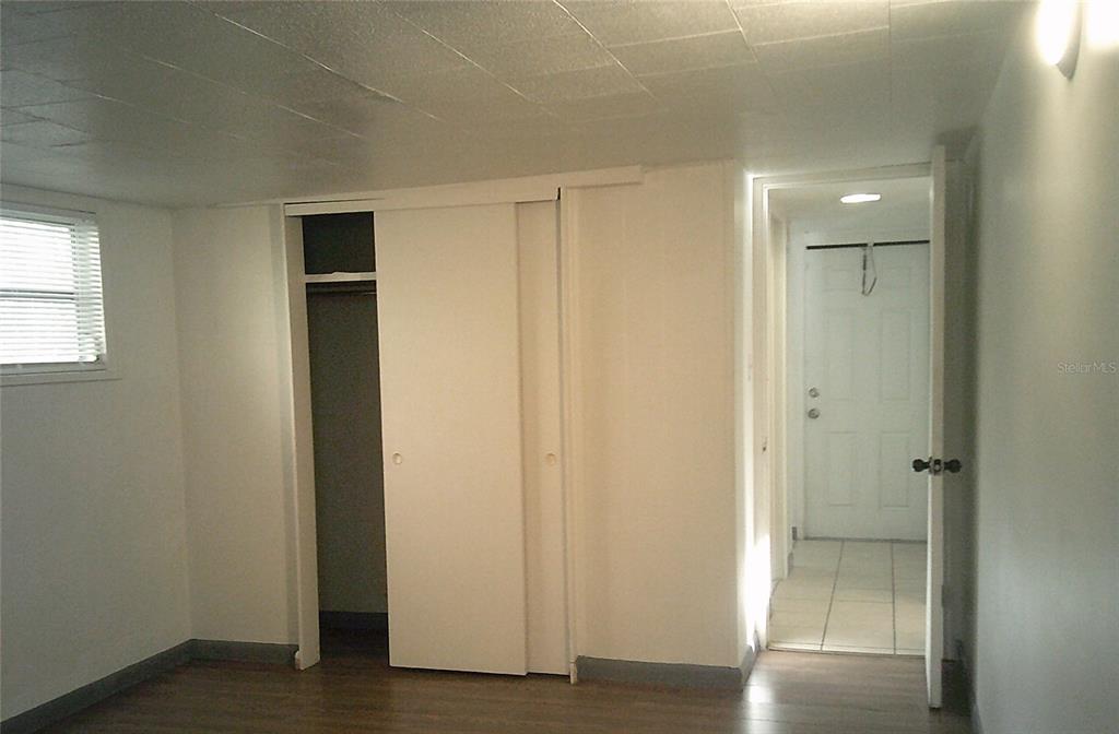 1060 65th Street South St. Petersburg, FL 33707 - Photo 14 of 20 a view of empty room with wooden floor