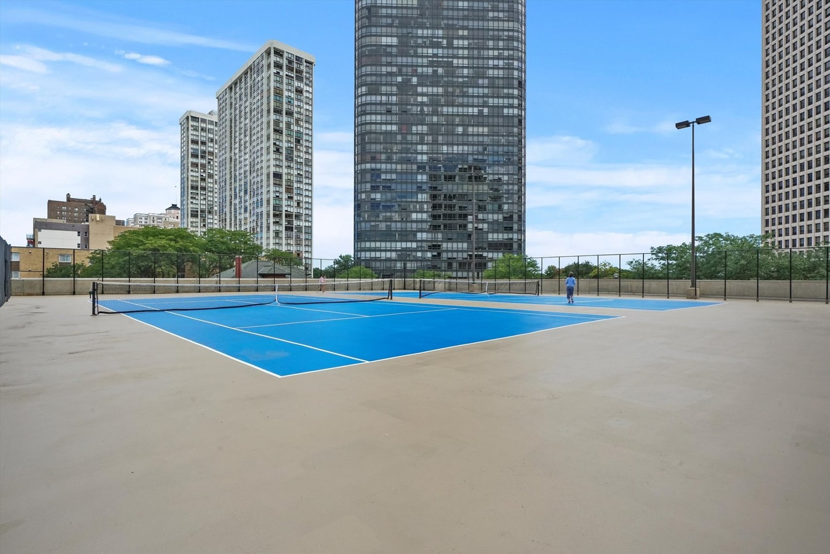 5320 North Sheridan Road, Unit 401 Chicago, IL 60640 - Photo 15 of 17 a view of a tennis court