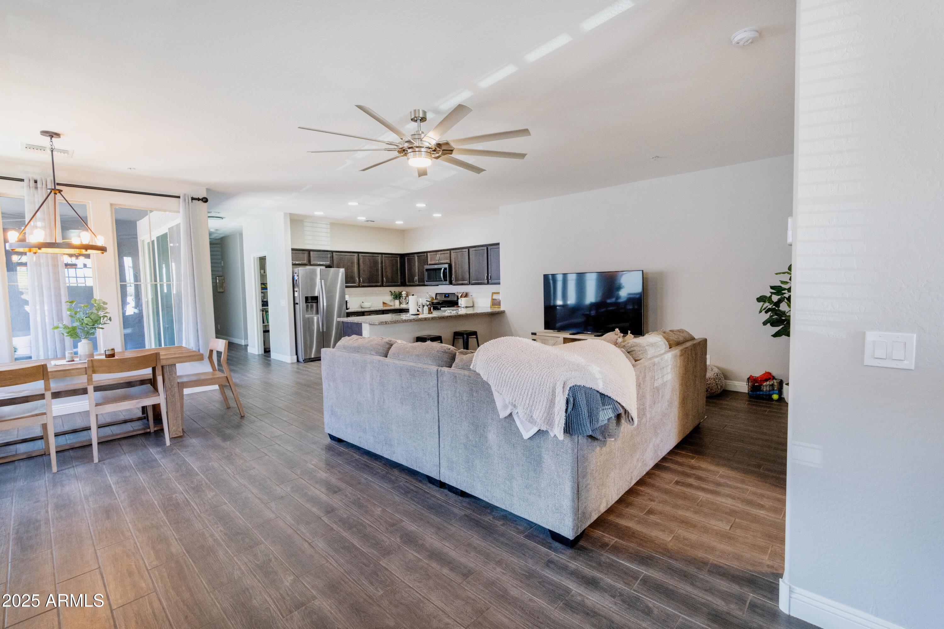 20753 West Legend Trail Buckeye, AZ 85396 - Photo 4 of 21 a bed room with a bed and furniture