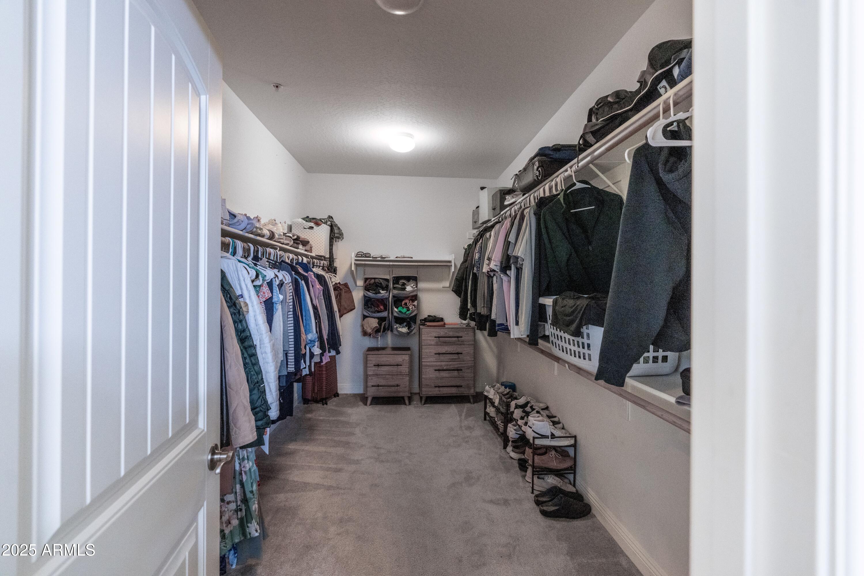 20753 West Legend Trail Buckeye, AZ 85396 - Photo 10 of 21 a view of a walk in closet