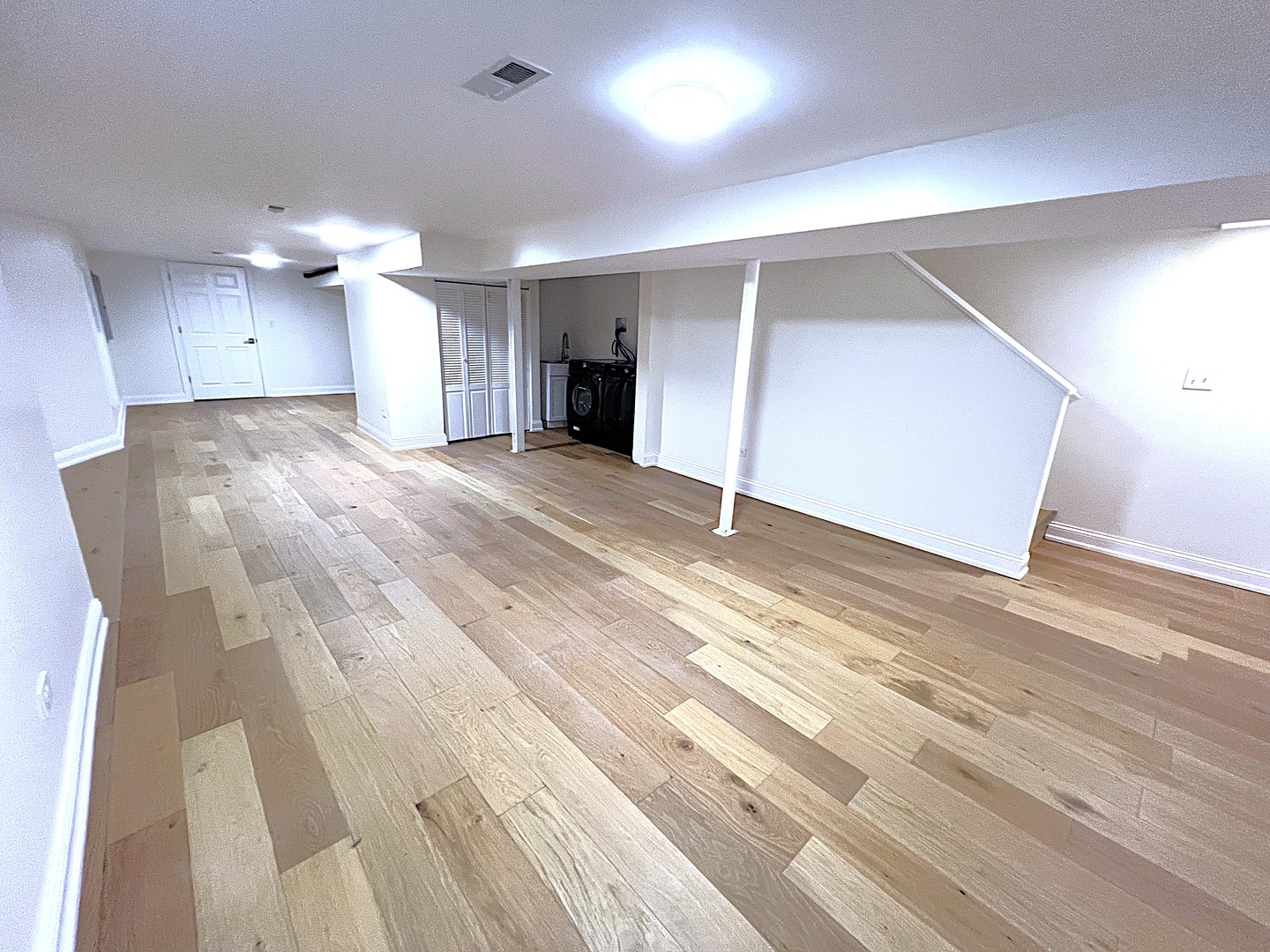 5320 West Ohio Street Chicago, IL 60644 - Photo 21 of 27 a view of empty room with wooden floor