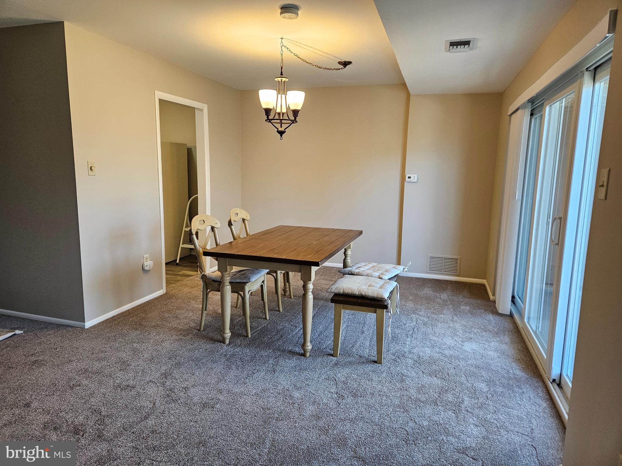 1375 Pershing Boulevard, Unit 307 Reading, PA 19607 - Photo 12 of 19 an empty room with a table and chairs