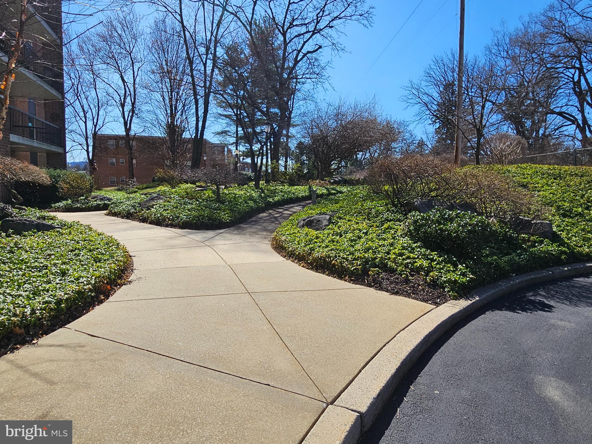 1375 Pershing Boulevard, Unit 307 Reading, PA 19607 - Photo 4 of 19 a view of a garden with pathway