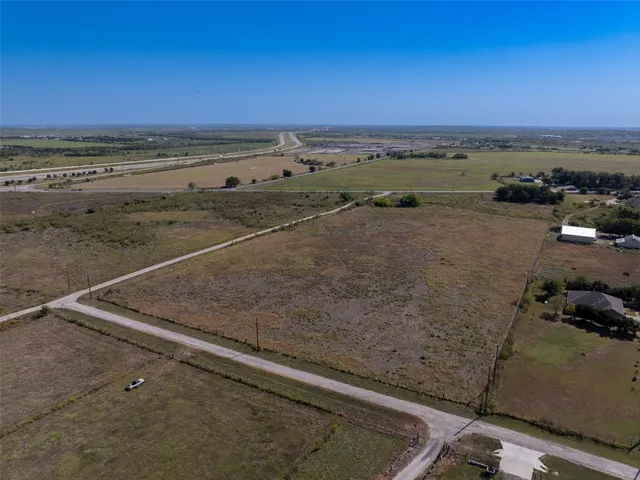an aerial view of beach and ocean