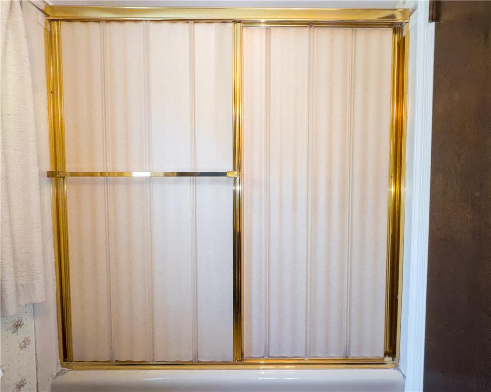 2270 Rodgers Street Bethlehem, PA 18017 - Photo 15 of 24 This bathroom features a shower enclosure with classic gold-toned framing.
