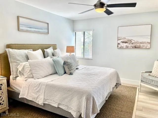 a large white bed in a white room