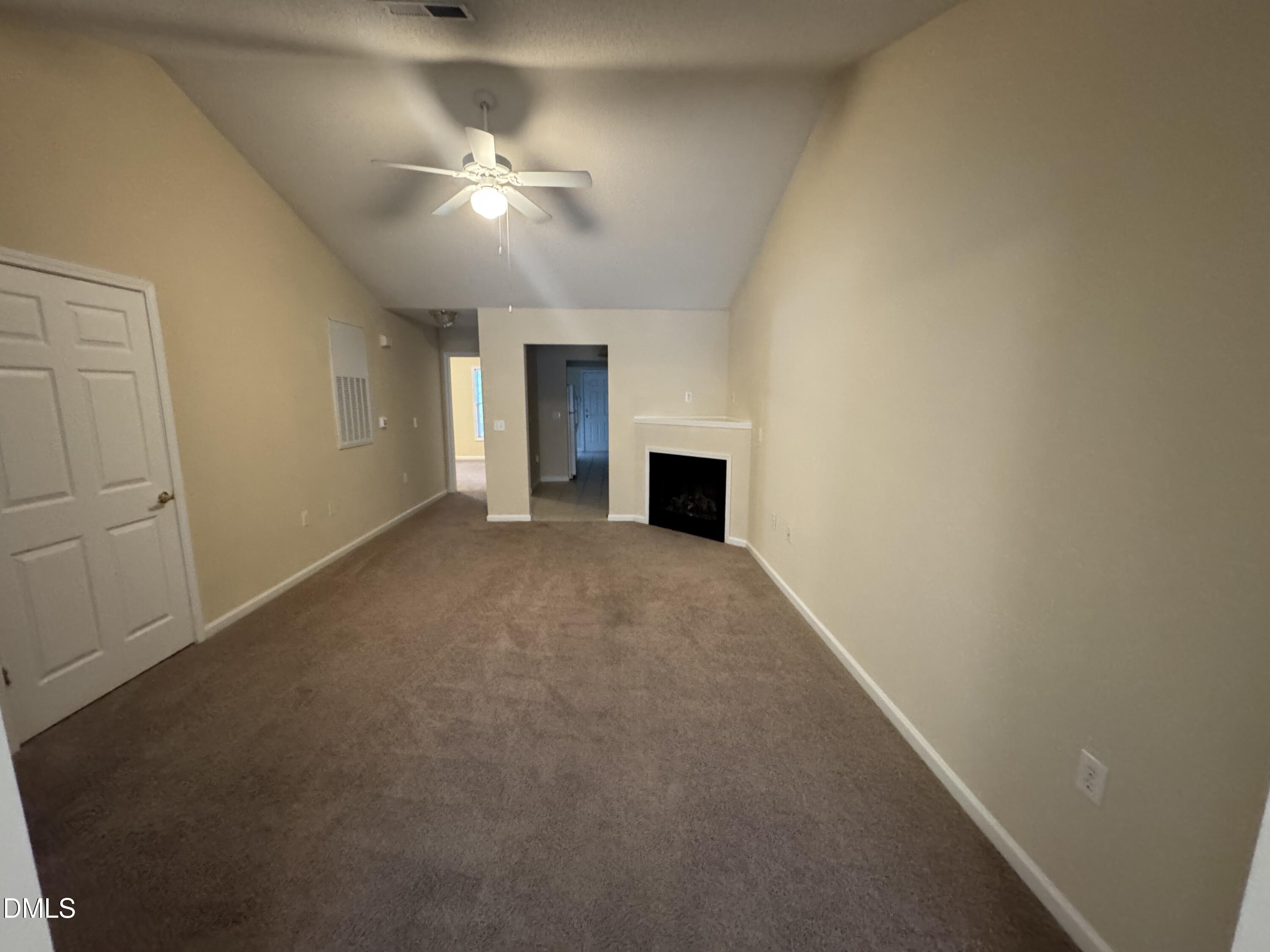 Undisclosed Address Raleigh, NC 27617 - Photo 11 of 22 en empty room with a ceiling fan and a window