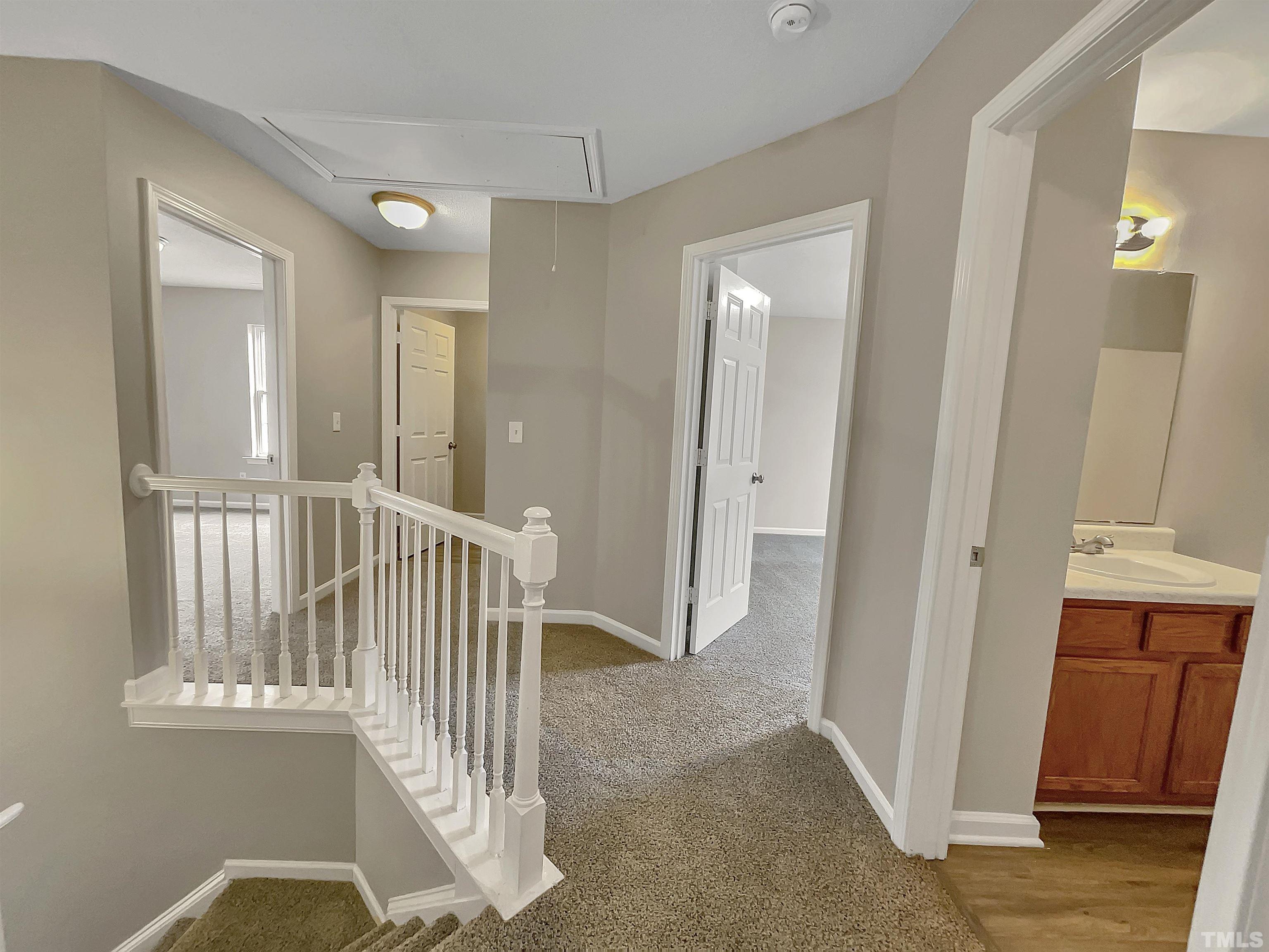 3360 Marshlane Way Raleigh, NC 27610 - Photo 12 of 17 a view of entryway with wooden floor