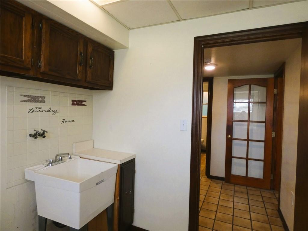 8459 Ridgemont Road Pittsburgh, PA 15237 - Photo 21 of 31 This large laundry room is sure to please!