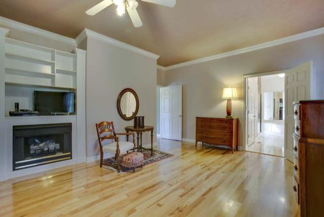 3473 Chicken Road Lebanon, TN 37090 - Photo 11 of 23 a living room with furniture a fireplace and a flat screen tv