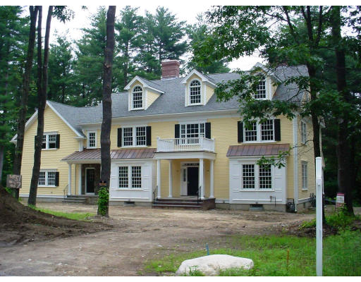 27 Woodworth Road Needham, MA 02492 - Photo 1 of 1 front view of a house with a yard