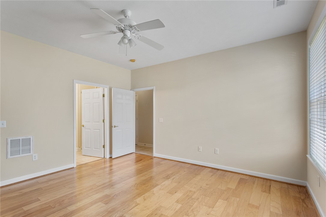 155 Life Style Lane Anderson, SC 29621 - Photo 20 of 49 This spacious room features elegant hardwood flooring and abundant natural light from the large window.