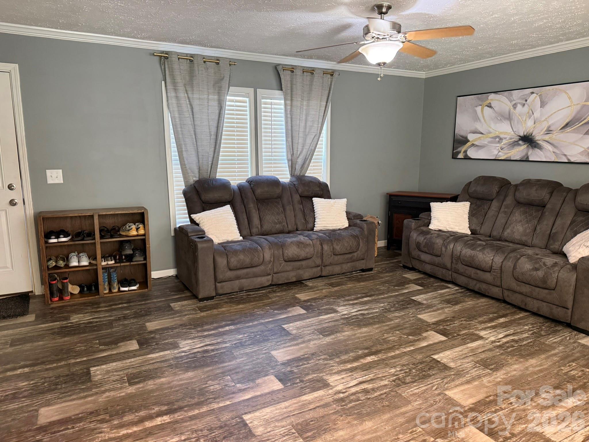 288 Walker Road Nebo, NC 28761 - Photo 3 of 18 a living room with furniture and a bookshelf