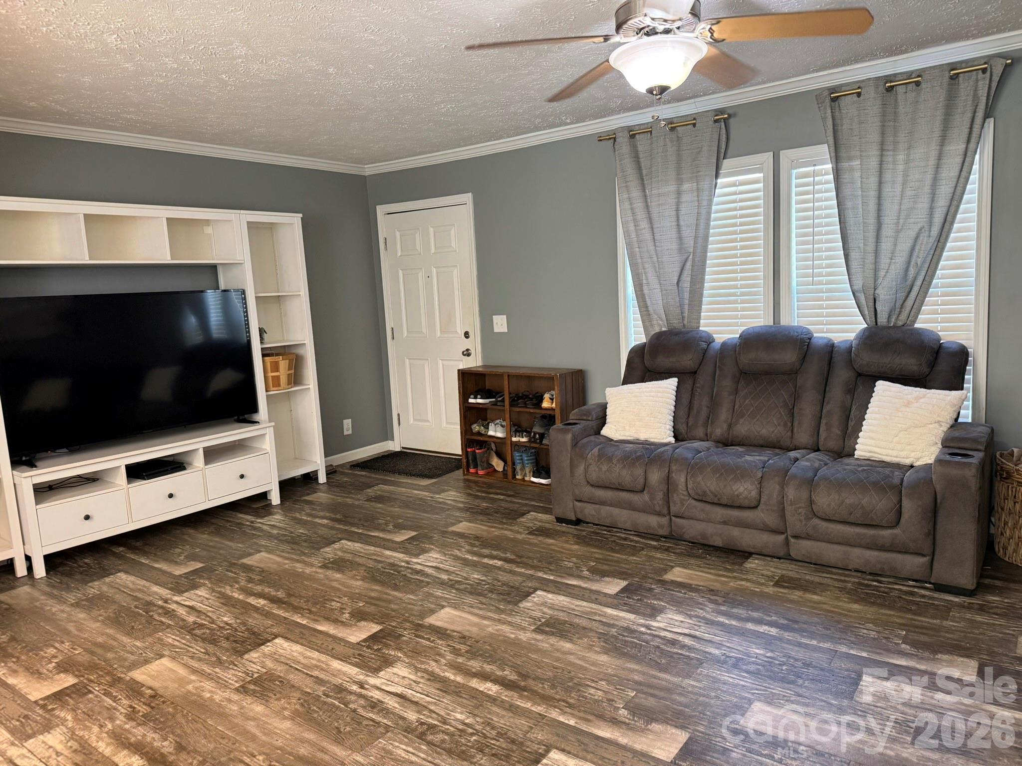 288 Walker Road Nebo, NC 28761 - Photo 4 of 18 a living room with furniture and a flat screen tv