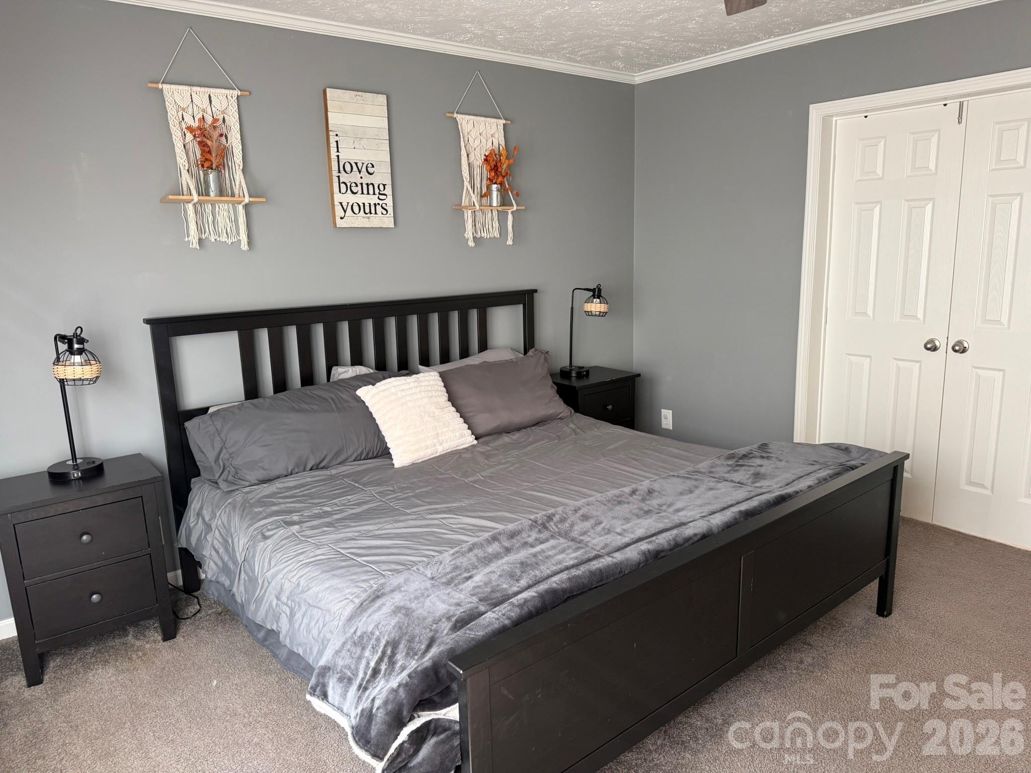 288 Walker Road Nebo, NC 28761 - Photo 7 of 18 a bedroom with a bed and wooden floor