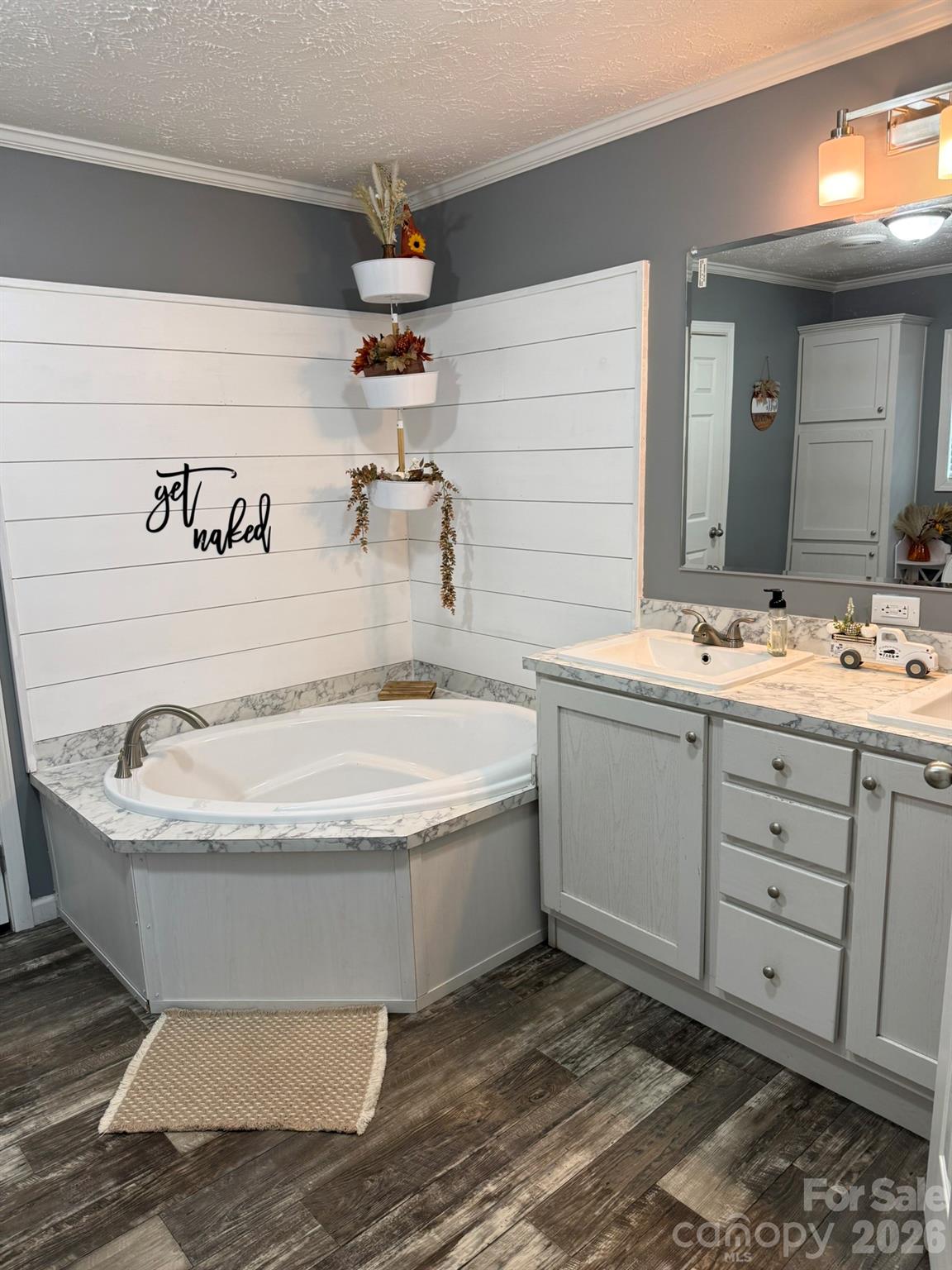 288 Walker Road Nebo, NC 28761 - Photo 8 of 18 a spacious bathroom with a bathtub and sink