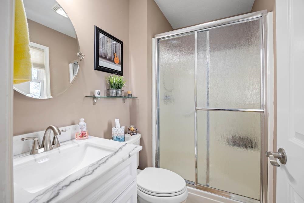 406 Three Leagues Road McGaheysville, VA 22840 - Photo 14 of 55 a bathroom with a sink toilet and shower