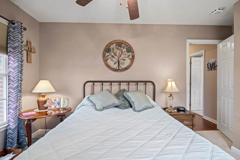 406 Three Leagues Road McGaheysville, VA 22840 - Photo 16 of 55 a bedroom with bed and a lamp