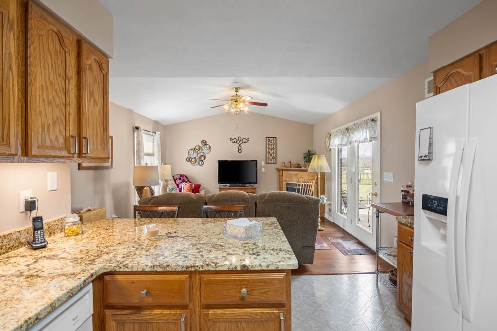 406 Three Leagues Road McGaheysville, VA 22840 - Photo 21 of 55 a view of living room with granite countertop furniture and fireplace