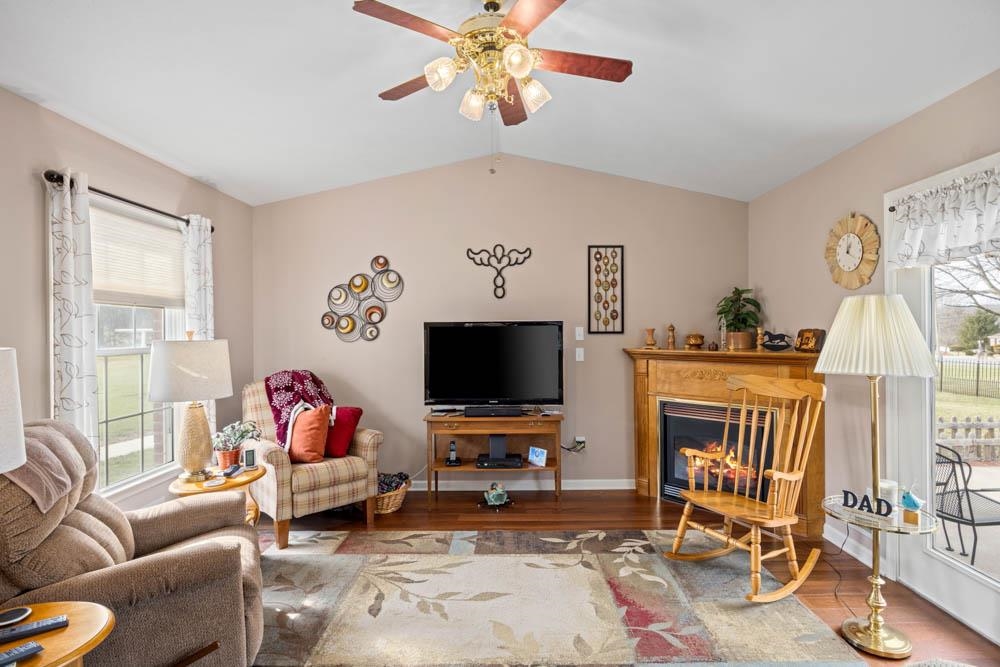406 Three Leagues Road McGaheysville, VA 22840 - Photo 22 of 55 a living room with furniture and a flat screen tv