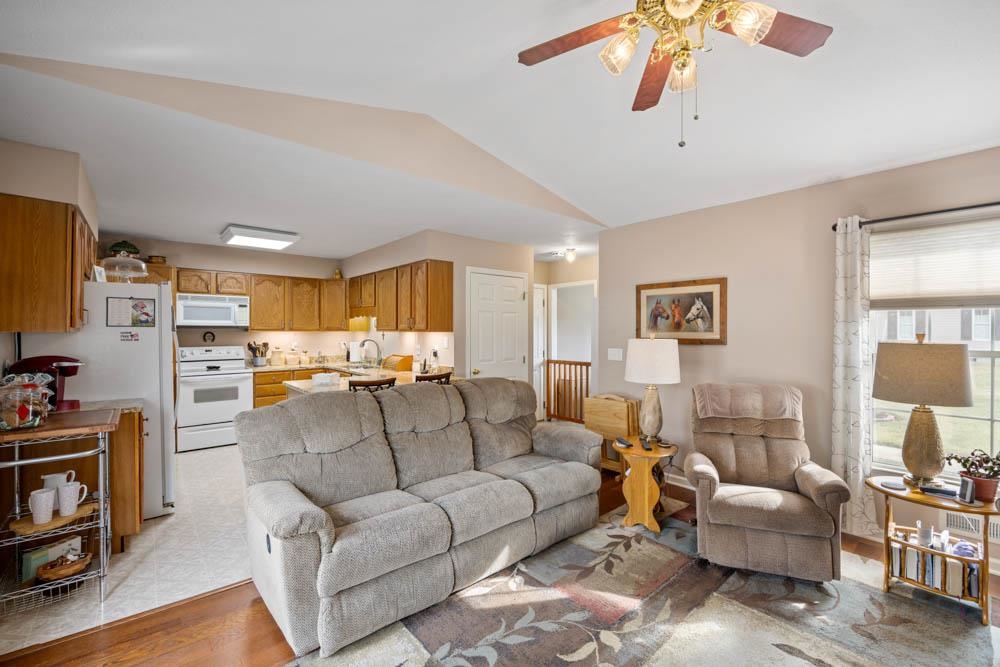 406 Three Leagues Road McGaheysville, VA 22840 - Photo 24 of 55 a living room with furniture and a flat screen tv