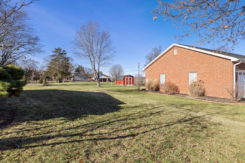 406 Three Leagues Road McGaheysville, VA 22840 - Photo 43 of 55 a view of a house with a yard