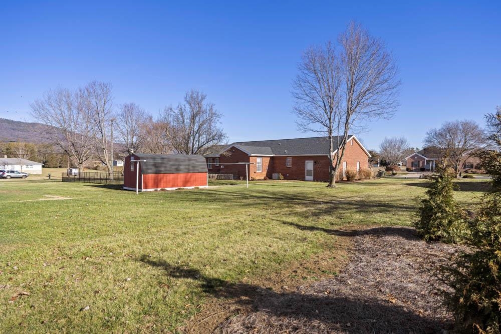 406 Three Leagues Road McGaheysville, VA 22840 - Photo 44 of 55 a view of a house with a yard