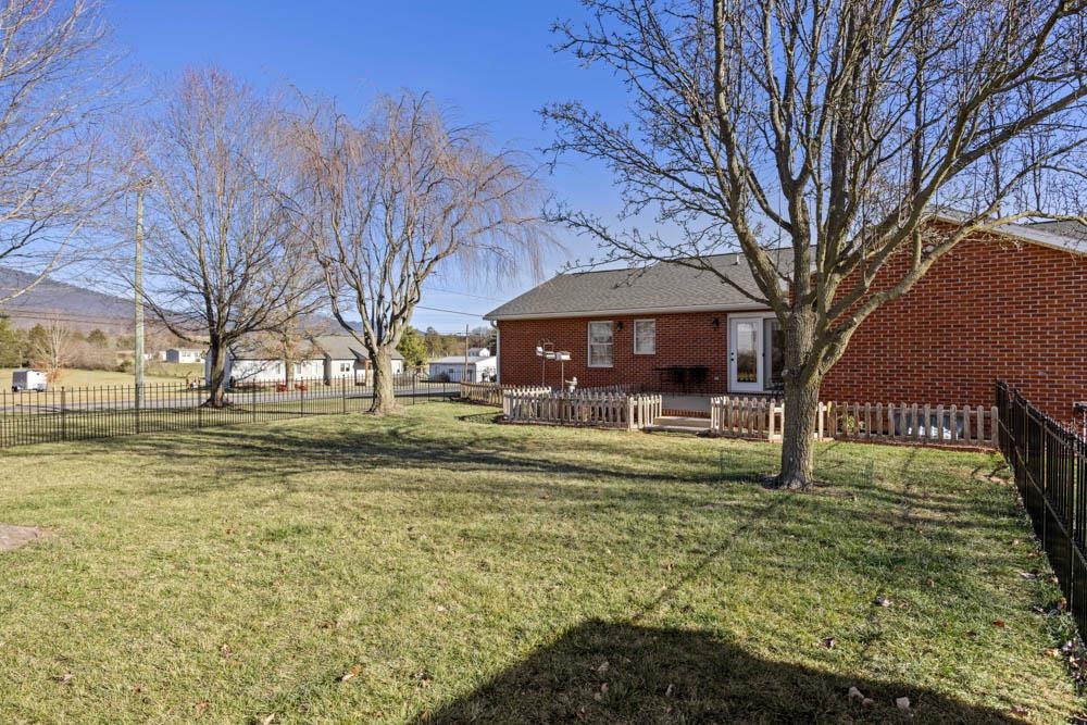 406 Three Leagues Road McGaheysville, VA 22840 - Photo 52 of 55 a view of a house with a yard