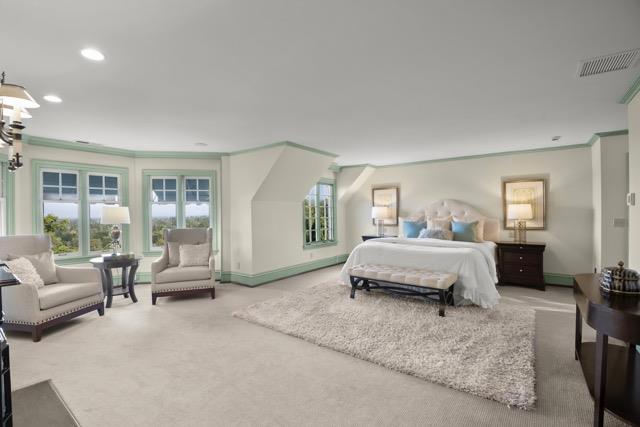 12359 Farr Ranch Road Saratoga, CA 95070 - Photo 22 of 51 a bedroom with a bed and glass window