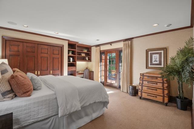 12359 Farr Ranch Road Saratoga, CA 95070 - Photo 35 of 51 a bedroom with a large bed and a large window