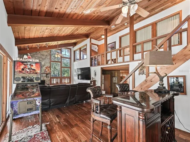 a view of a chairs and table in a patio