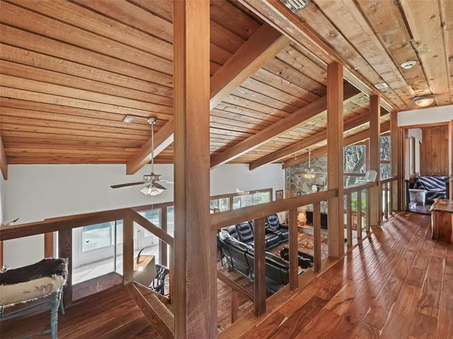 a view of a balcony with chairs