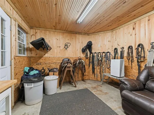 a view of a patio with table and chairs