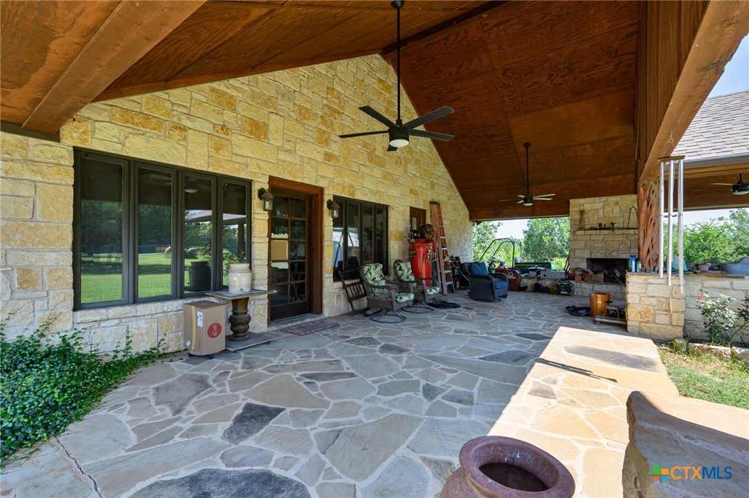 725 County Road 300 Hamilton, TX 76531 - Photo 29 of 41 a view of a chairs and table in the patio