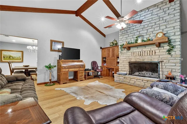 a kitchen with stainless steel appliances granite countertop a stove sink and cabinets