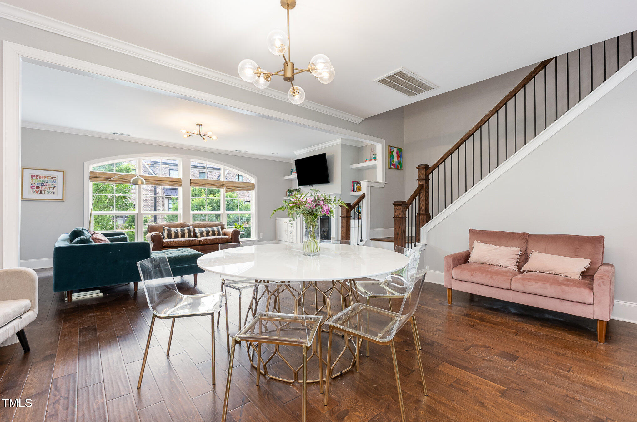 Undisclosed Address Raleigh, NC 27607 - Photo 4 of 15 a view of a dining room with furniture window and wooden floor