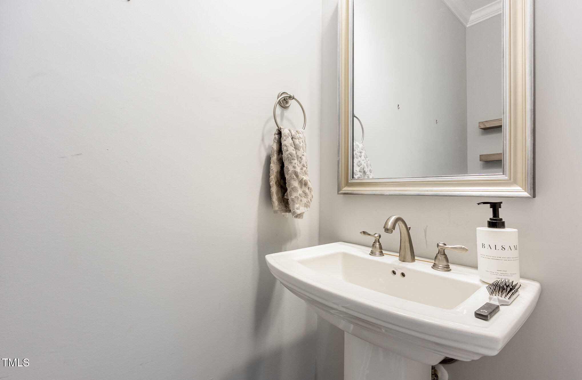 Undisclosed Address Raleigh, NC 27607 - Photo 6 of 15 a bathroom with a sink and a mirror