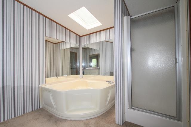 387 Needmore Road Mount Juliet, TN 37122 - Photo 11 of 20 Relax at the end of the day in the corner soaking tub.