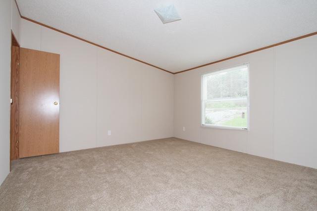387 Needmore Road Mount Juliet, TN 37122 - Photo 13 of 20 The second bedroom overlooks the front yard and features a walk-in closet.